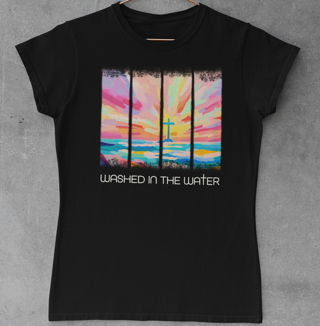 Black t-shirt with a colorful graphic and text 'Washed in the Water' on a gray background