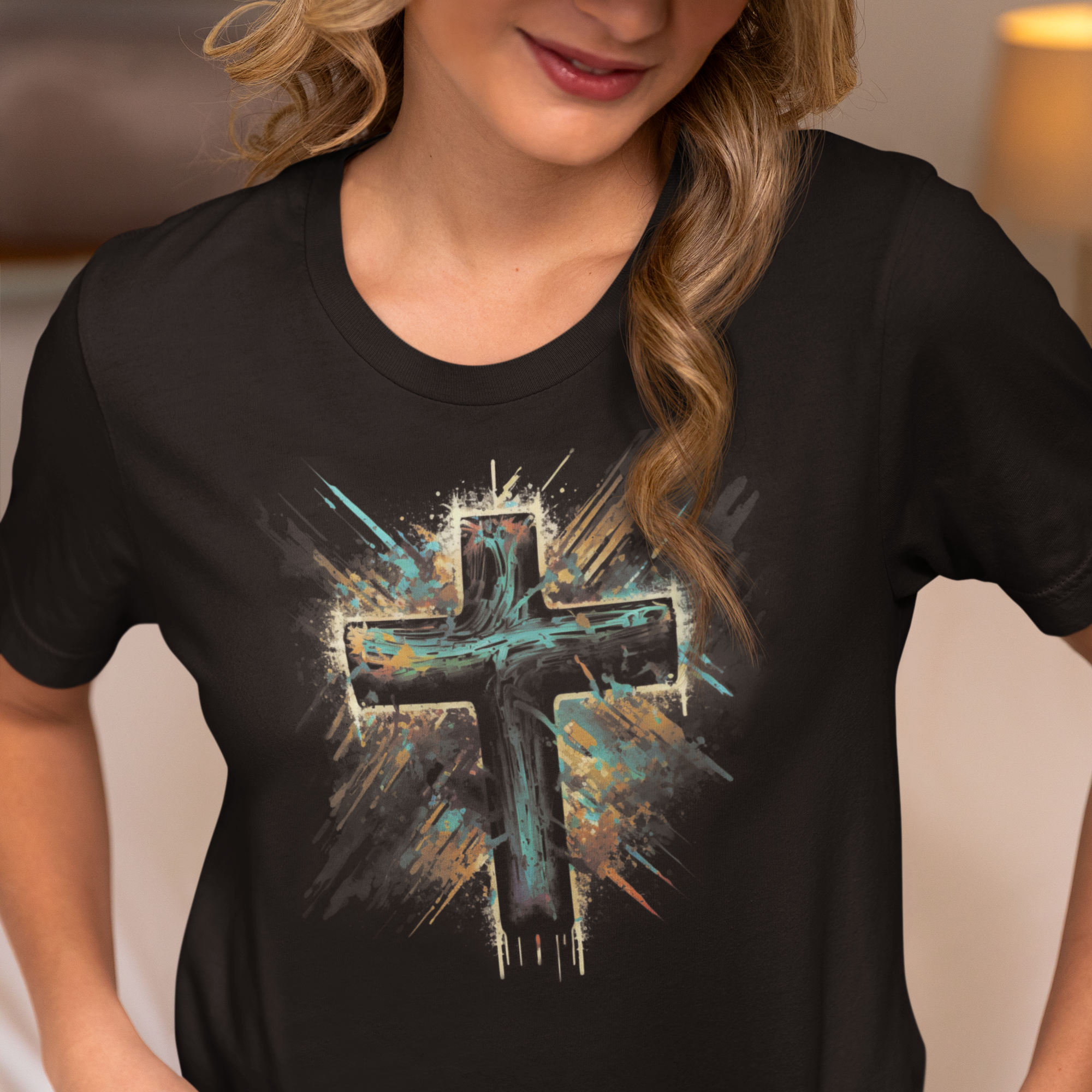 Person wearing a black t-shirt with a cross design, standing indoors.