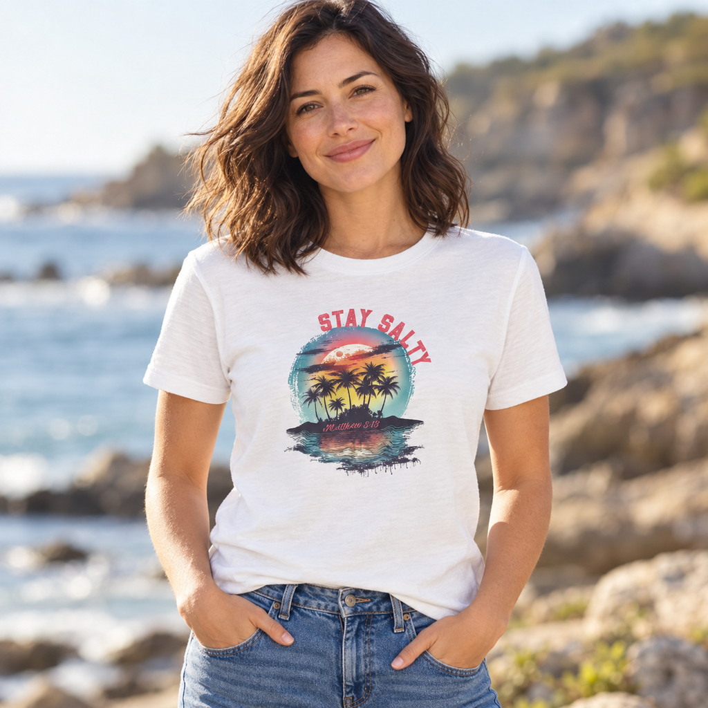 Woman wearing the white Salty 2 Front Only Classic T-shirt with sunset and palm-tree Stay Salty artwork